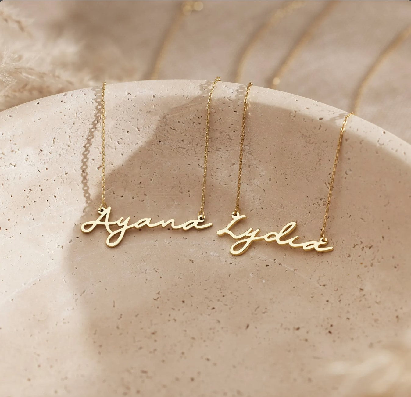 Dainty 18K Gold-plated personalized name necklace. A minimalist, custom jewelry Christmas gift