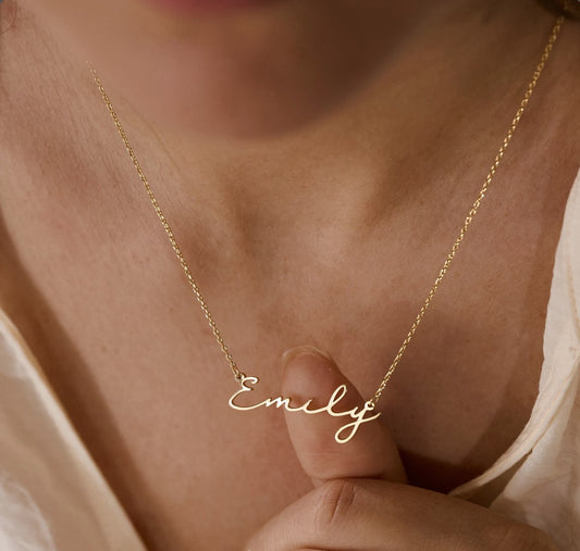 Dainty 18K Gold-plated personalized name necklace. A minimalist, custom jewelry Christmas gift